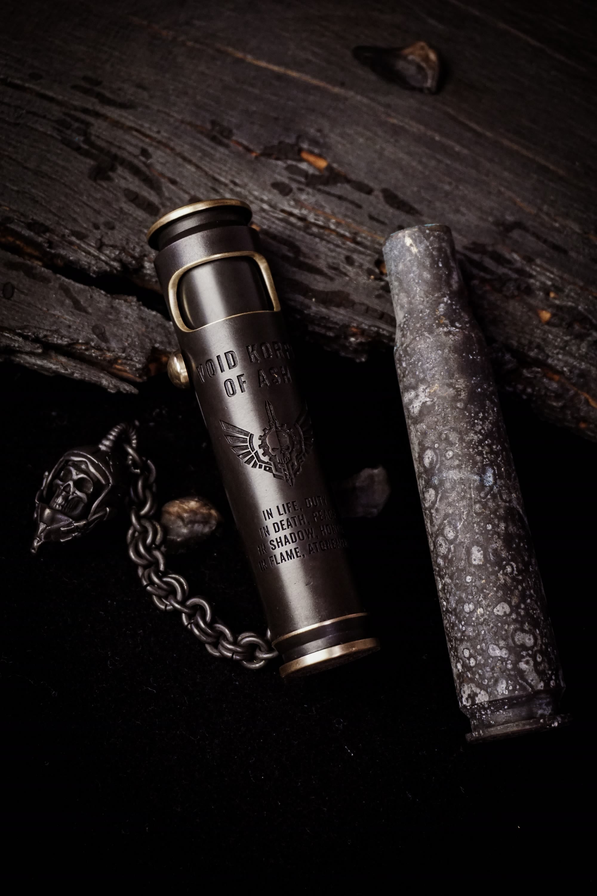 Large Void Korps dark fantasy lighter displayed with its pirate-black finish and chain