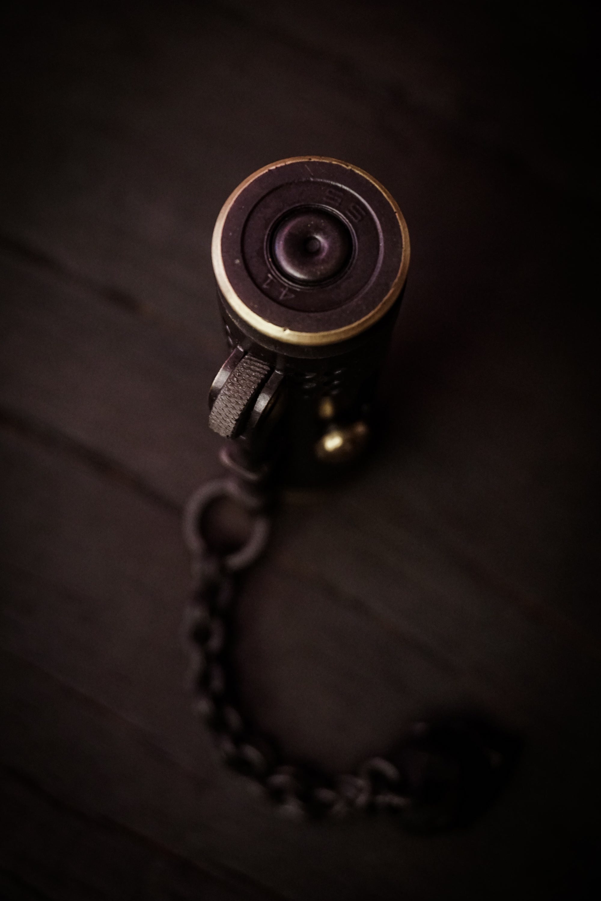 Large Void Korps circular base cap and brass rim detail on the skull lighter