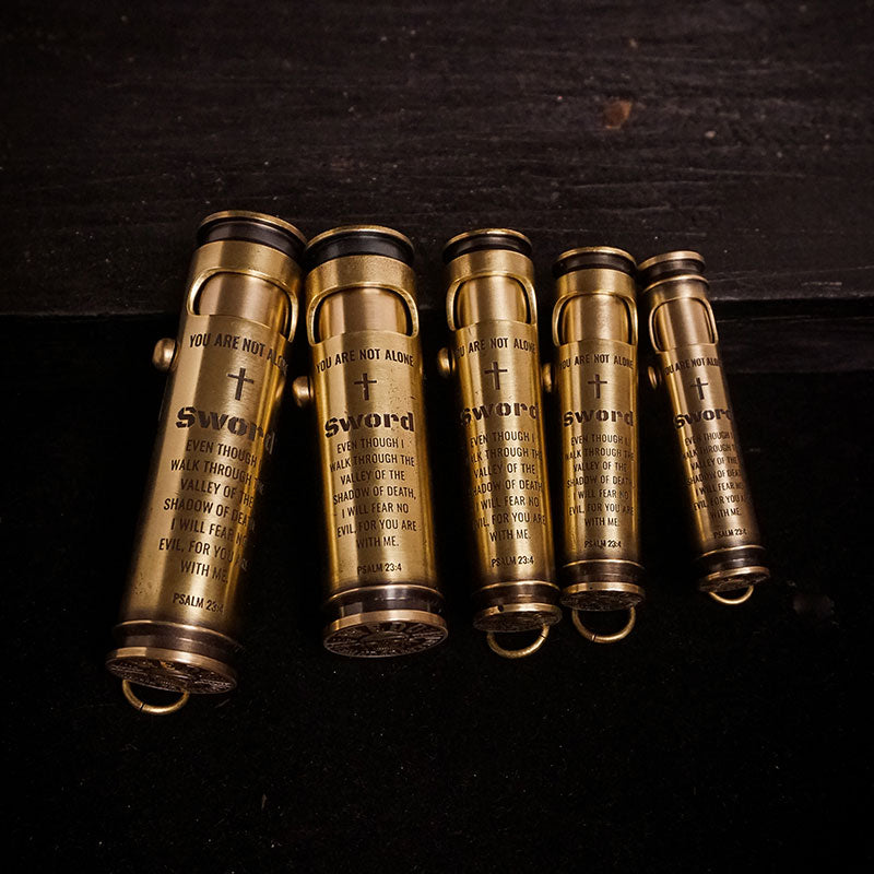 Brass lighter available in sizes ranging from small to large, featuring engraved scripture and a name.