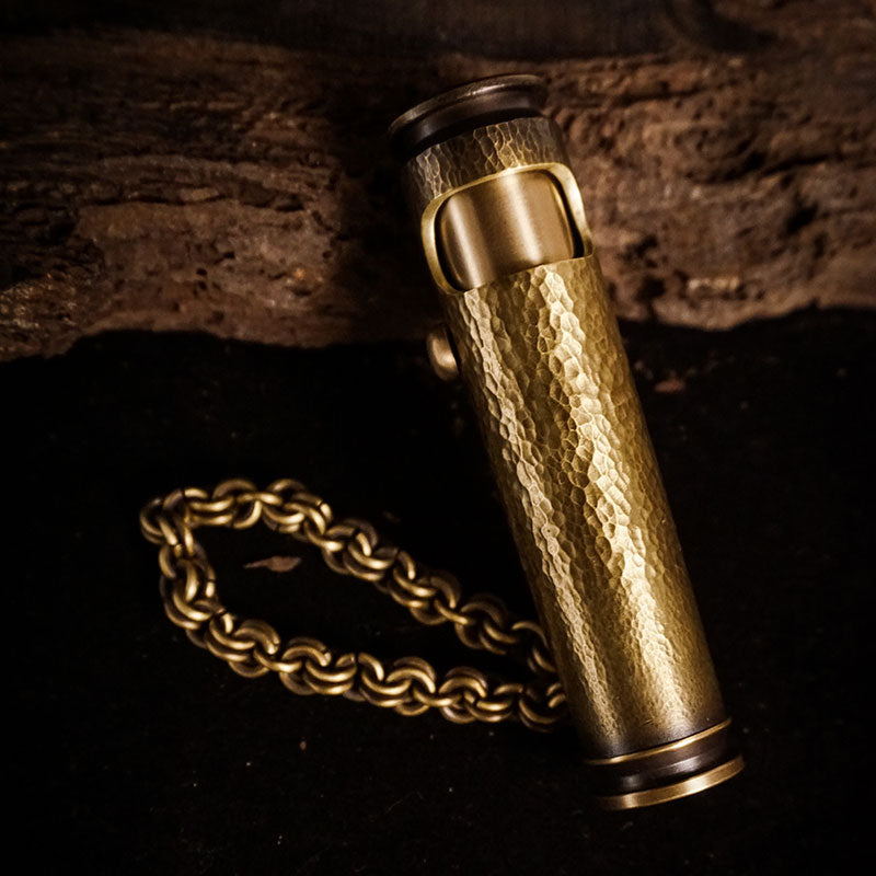 Handmade lighter with hammered brass texture and WEDO craft surface