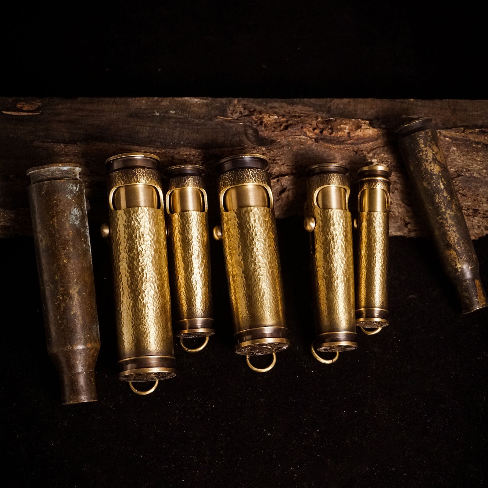 WEDO handmade brass lighters with different craft finishes including classic brass hammered aged and darkened surfaces