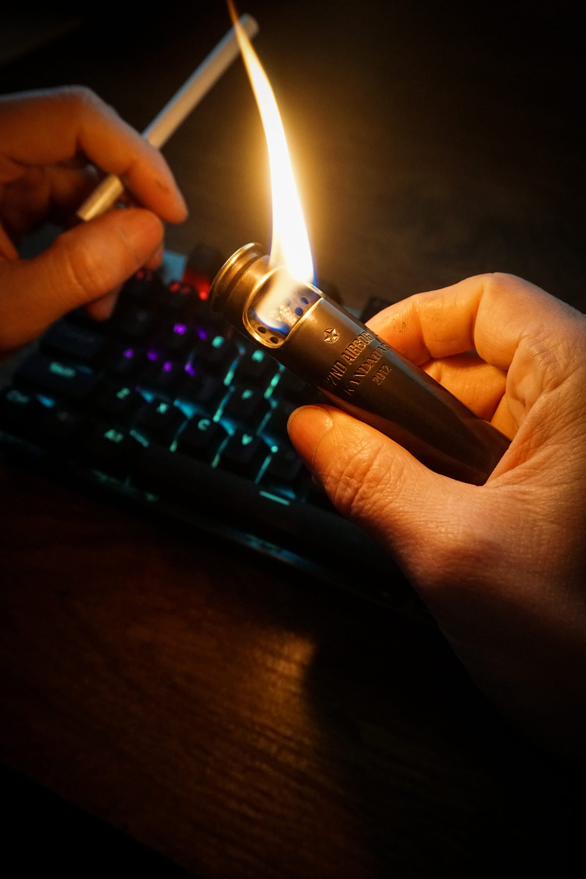 Fire bursts from the Engraved Lighter