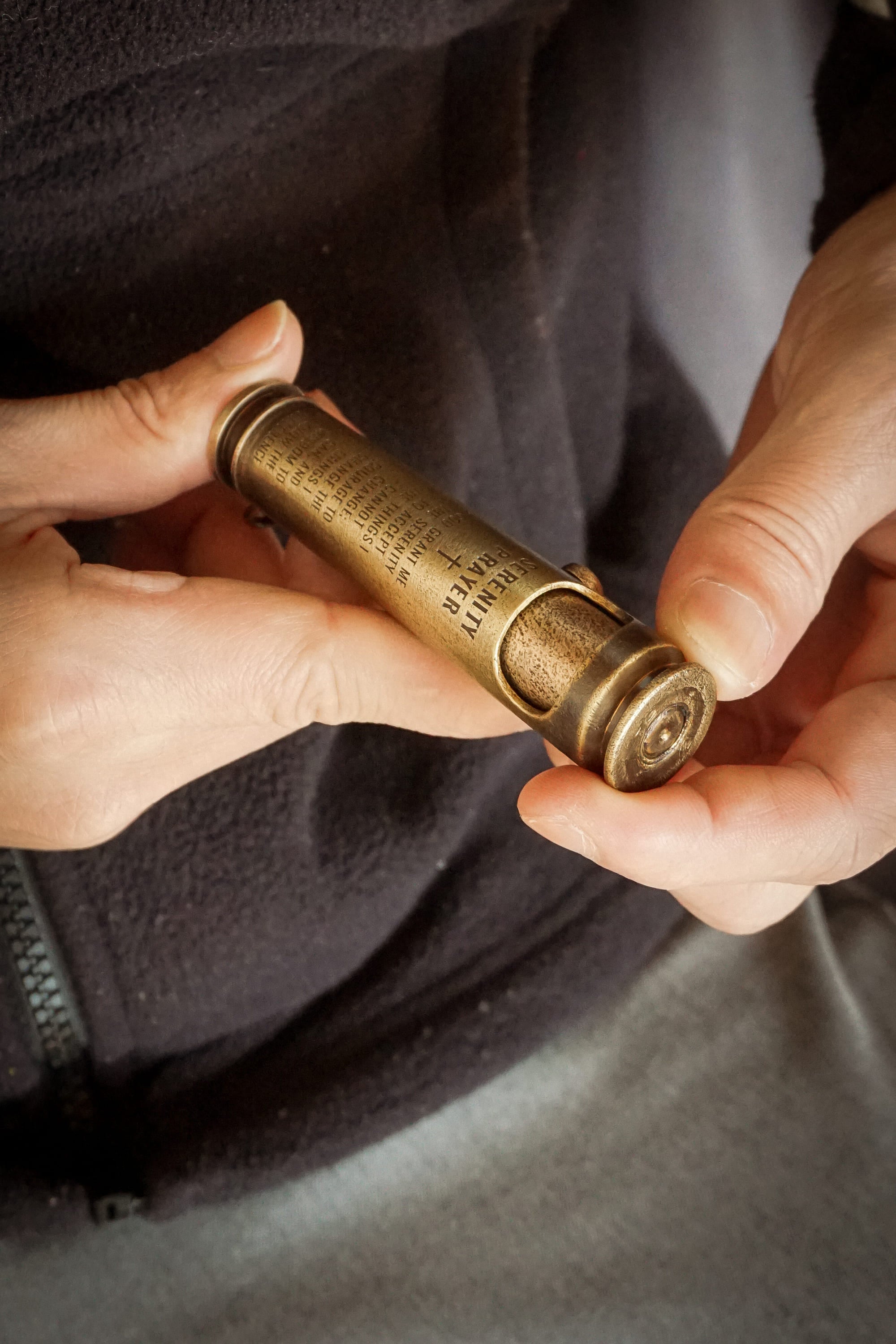 Tabletop Lighter, hold it in your hand and view the engraved text