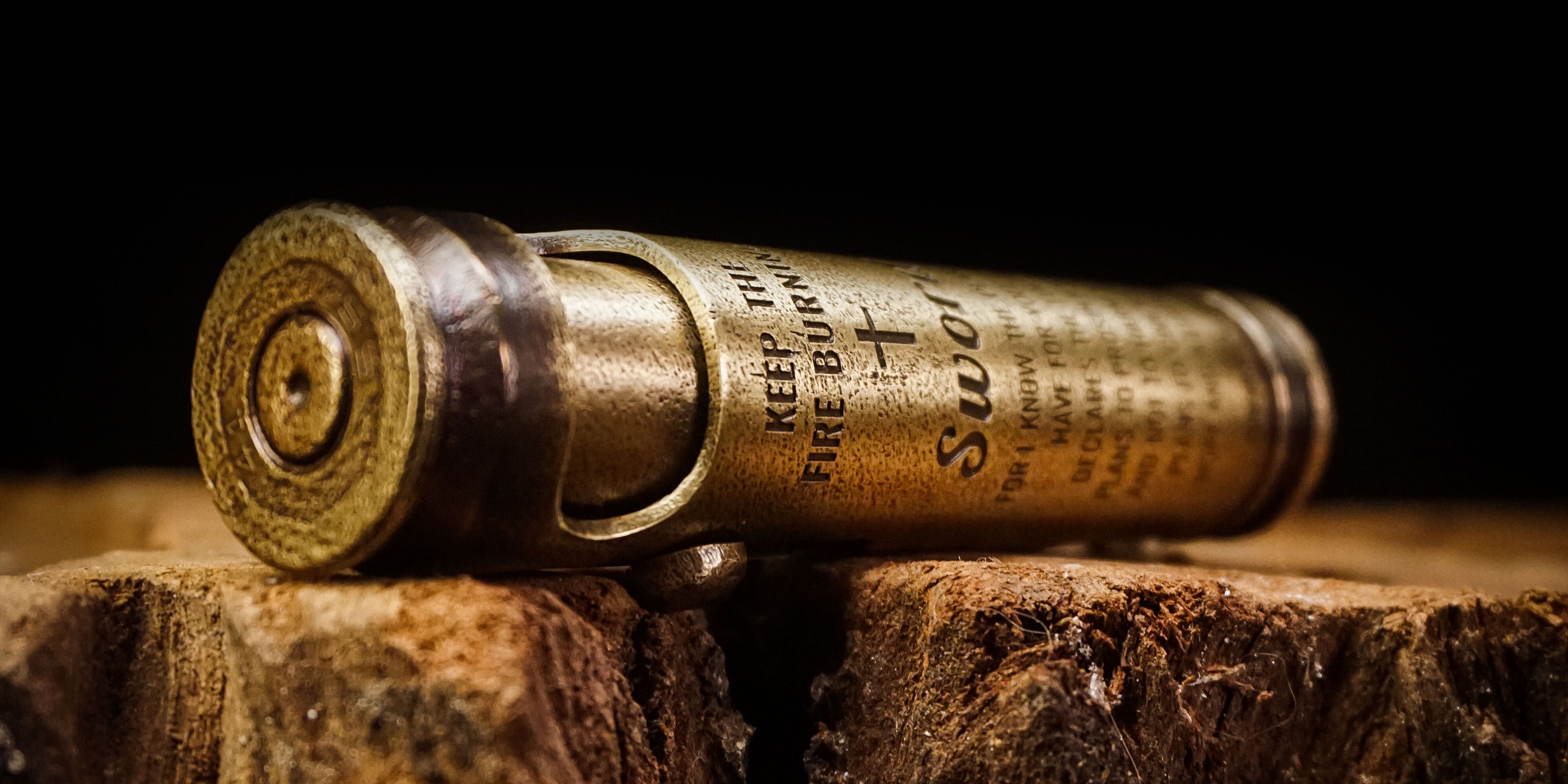 Custom engraved WEDO brass shell lighter close-up
