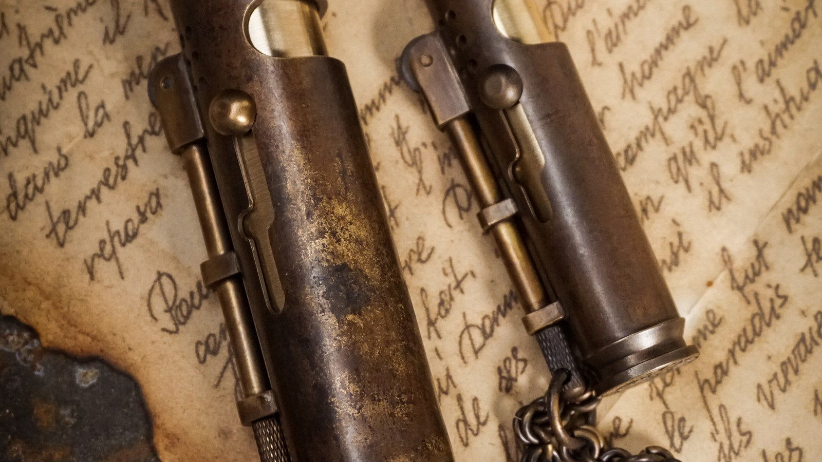 Vintage brass lighter in a careful inspection setting before refilling