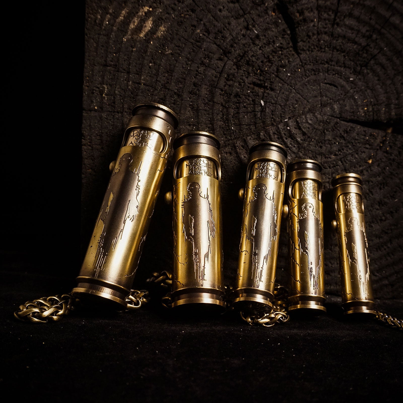 Collectible dark fantasy WEDO brass shell lighters with monster carving, brass shell bodies, and engraved surface detail